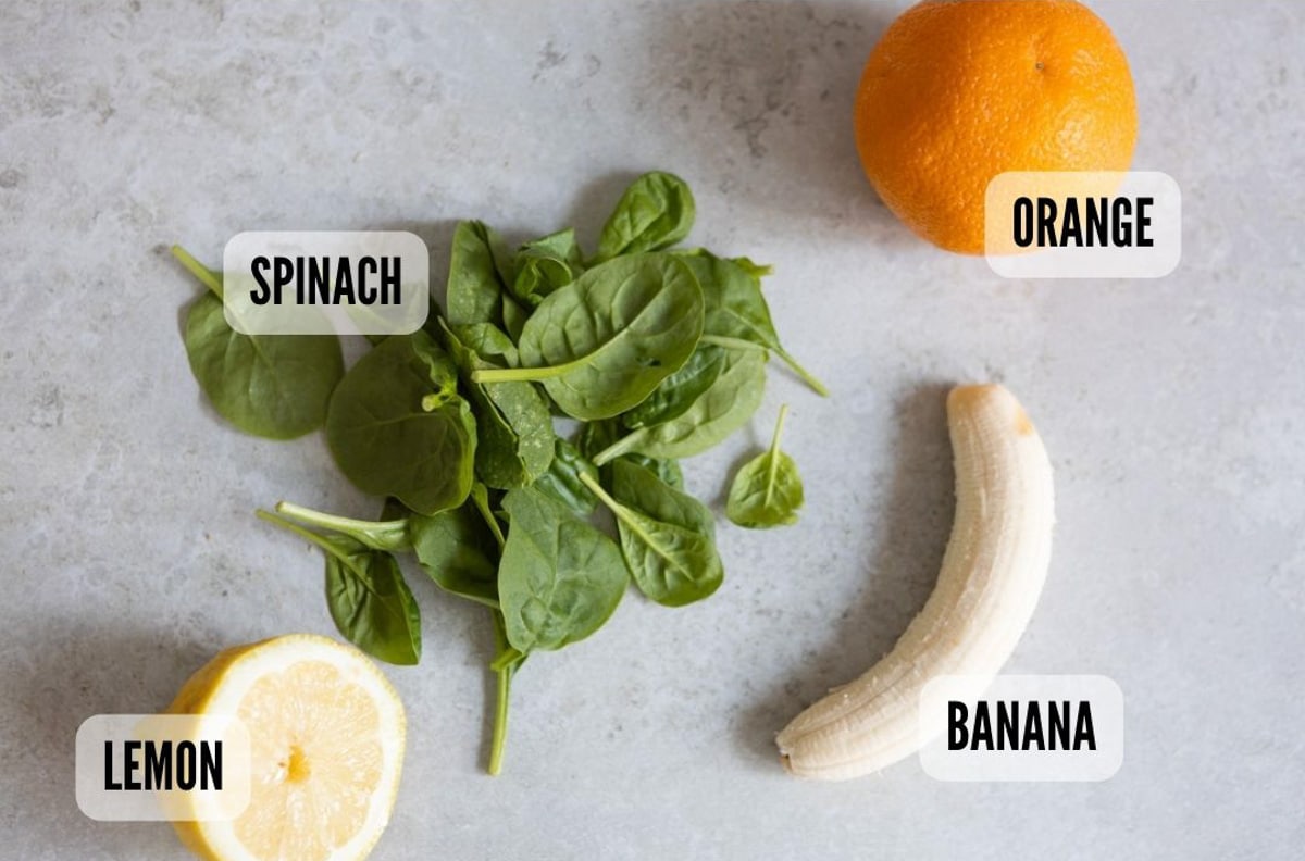 Ingredients of a smoothie on a light grey background.