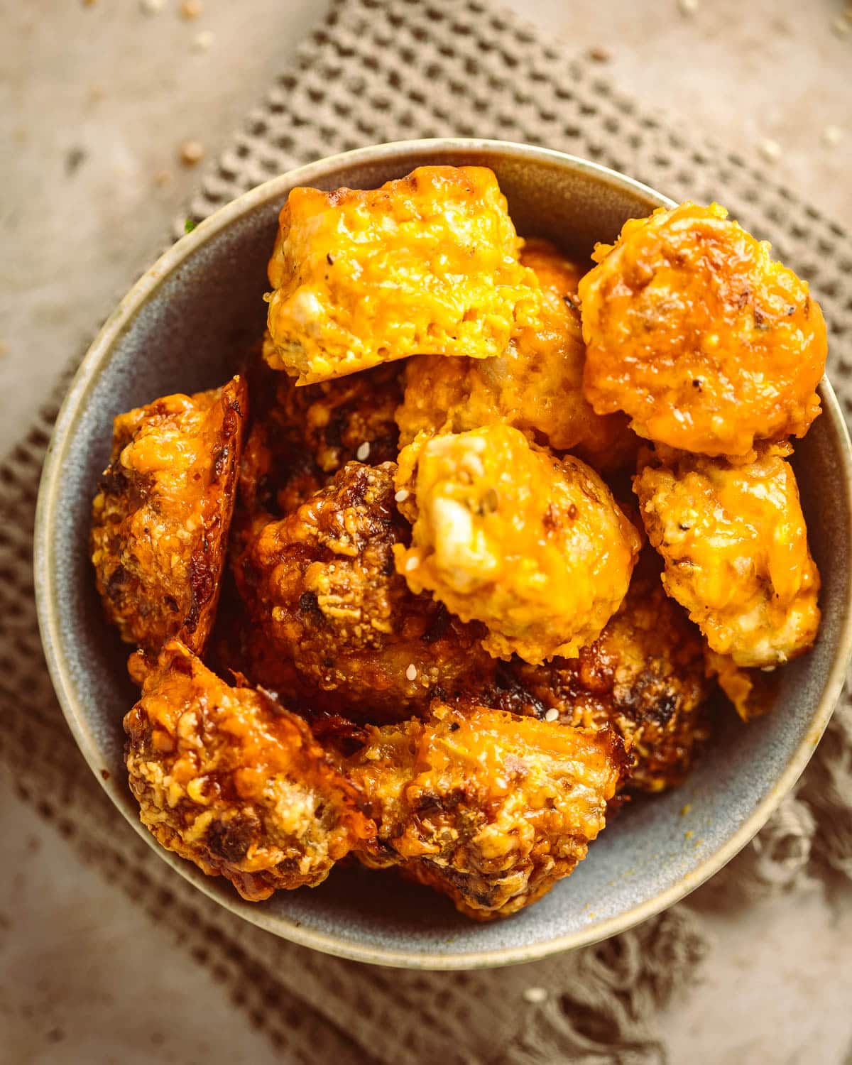 A bowl with gluten free chicken meatballs.