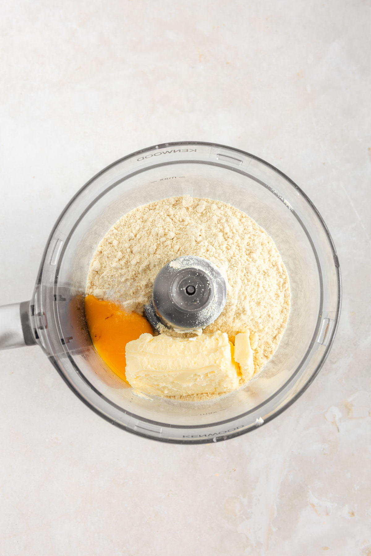 A top-down shot of lemon mousse tart  base layer, unmixed.