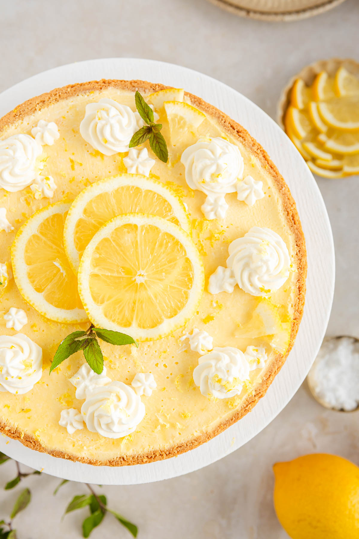 View from above of a decorated lemon mousse tart.