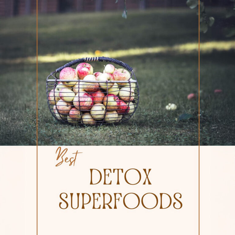 A title image of a post about detox superfoods, featuring a basket full of apples.