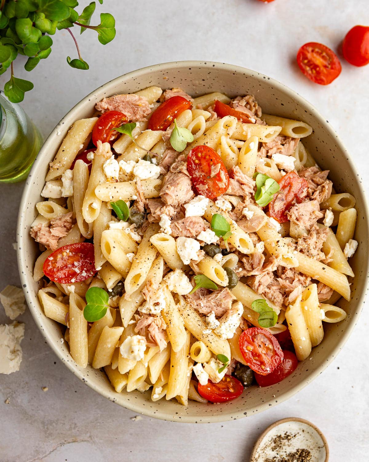 A top-down shot of a bowl of no-mayo tuna pasta salad.