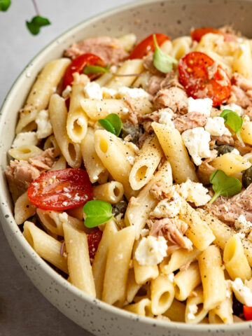 A closeup shot of pasta tuna salad bowl with ricotta cheese.