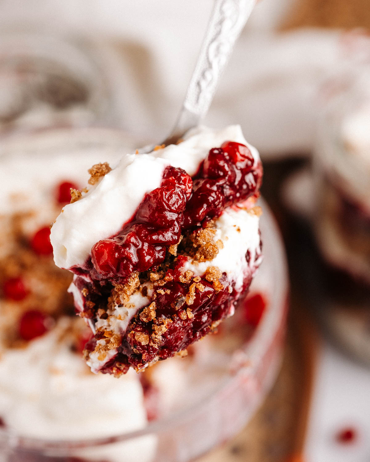 A spoon with rye bread trifle.